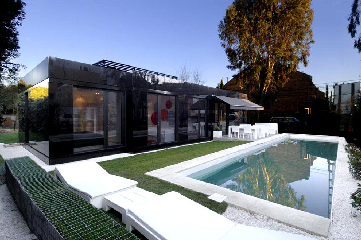 Pool outside luxury home