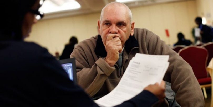 Man contemplating to buy land