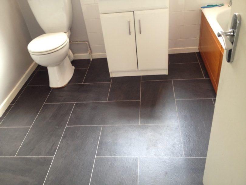 Grey linoleum bathroom floor