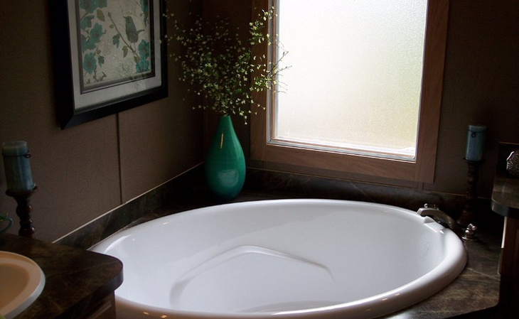 Small bathroom oval tub