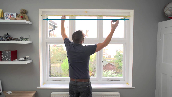 Taking measurements of window