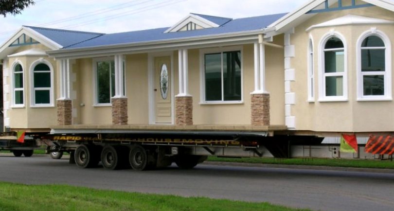 Transporting triple wide mobile home