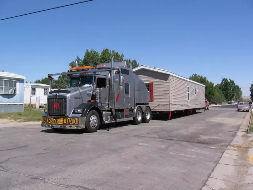 Truck moving mobile home