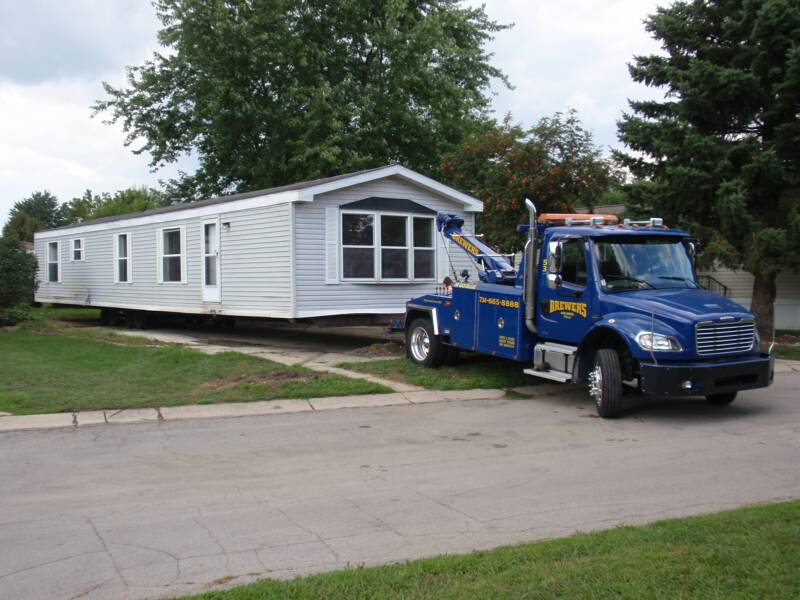 Truck moving mobile house
