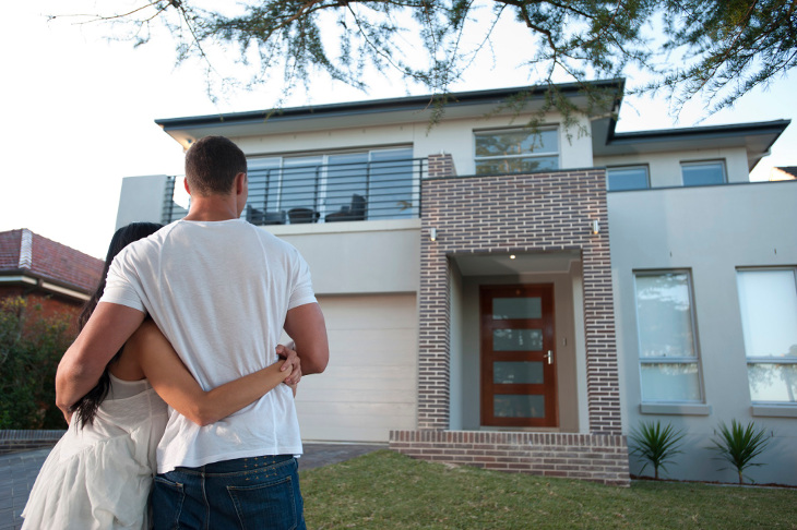 Couple looking at new house