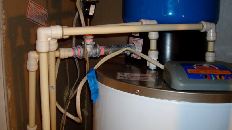 Gas water heater compression