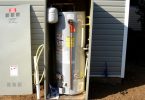 Water heater outside enclosure