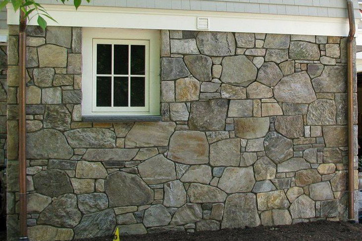 Simulated stone siding