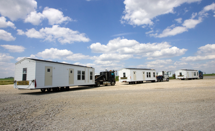 Mobile homes being transported